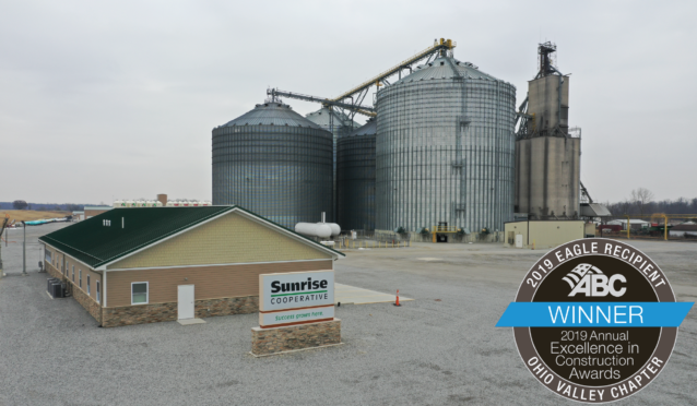 Overview of Sunrise Cooperative grain bins and office. Labeled 2019 ABC EIC Eagle Award winner.