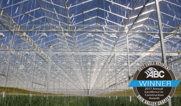 Interior of golden fresh greenhouse with plants growing. Labeled 201 7ABC EIC Eagle Award winner.